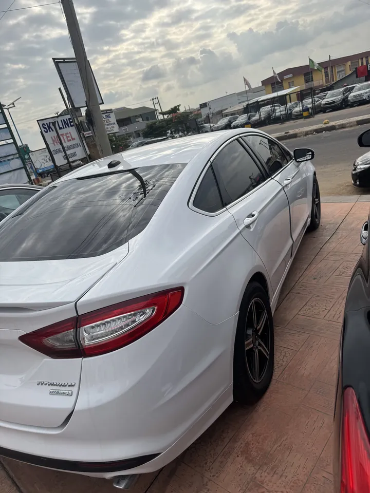 2013 Ford Fusion Titanium, white, rear 3/4, photo 4 of 6