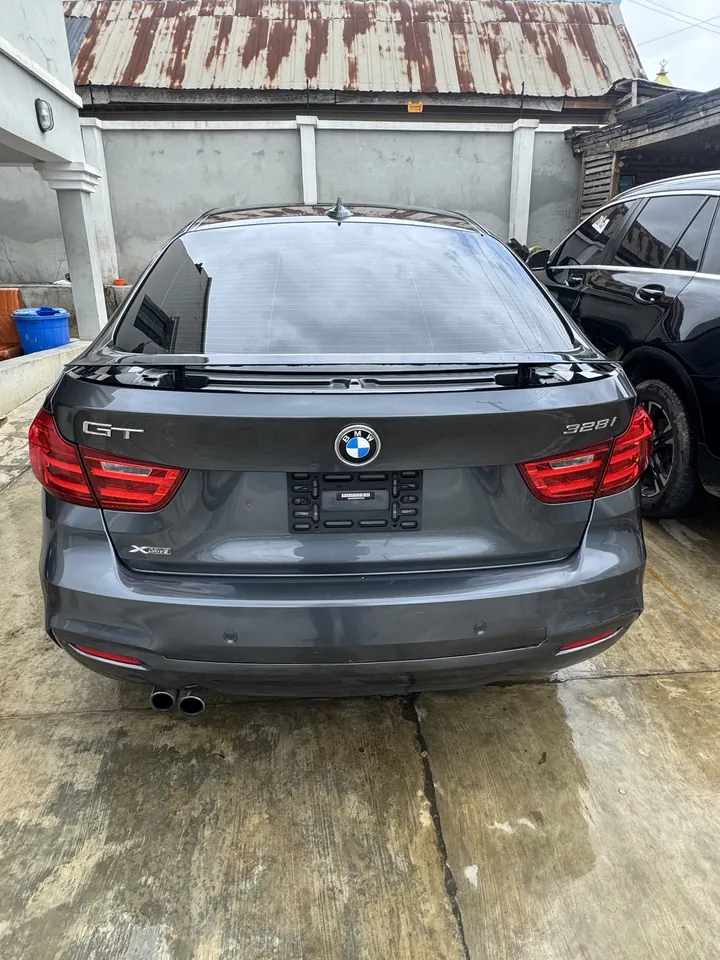 2015 BMW 328i Gran Turismo xDrive, ash (dark grey), rear, photo 4 of 8