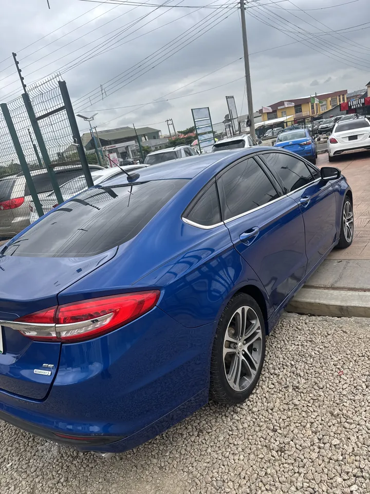 2017 Ford Fusion SE, blue, rear 3/4, photo 4 of 8