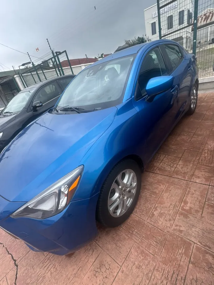 2018 Toyota Yaris iA, blue, front 3/4, photo 2 of 8