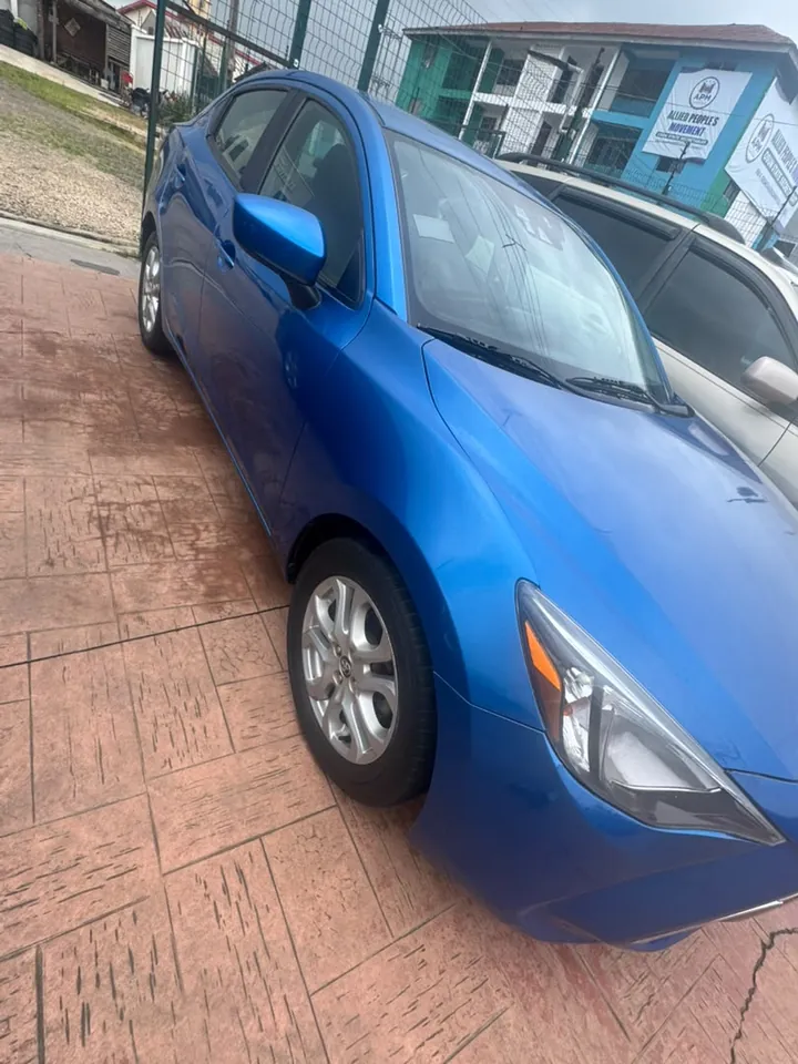 2018 Toyota Yaris iA, blue, front 3/4 (other side), photo 3 of 8